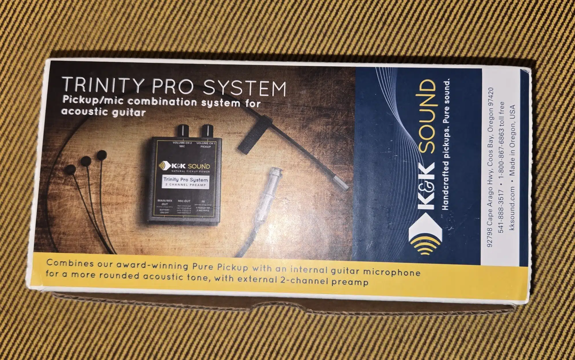 Box packaging for the K&K Sound Trinity Pro System acoustic guitar pickup and microphone set.